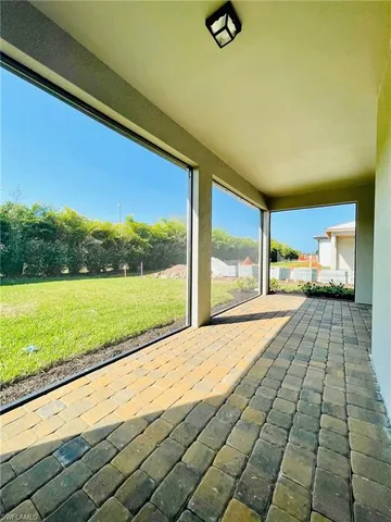 a view of swimming pool from a balcony