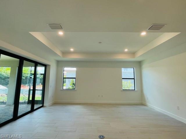 1962 Tripletail Lane Naples, FL 34114 - Photo 10 of 39 a view of an empty room with a window