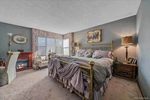 a bedroom with a bed and a machine