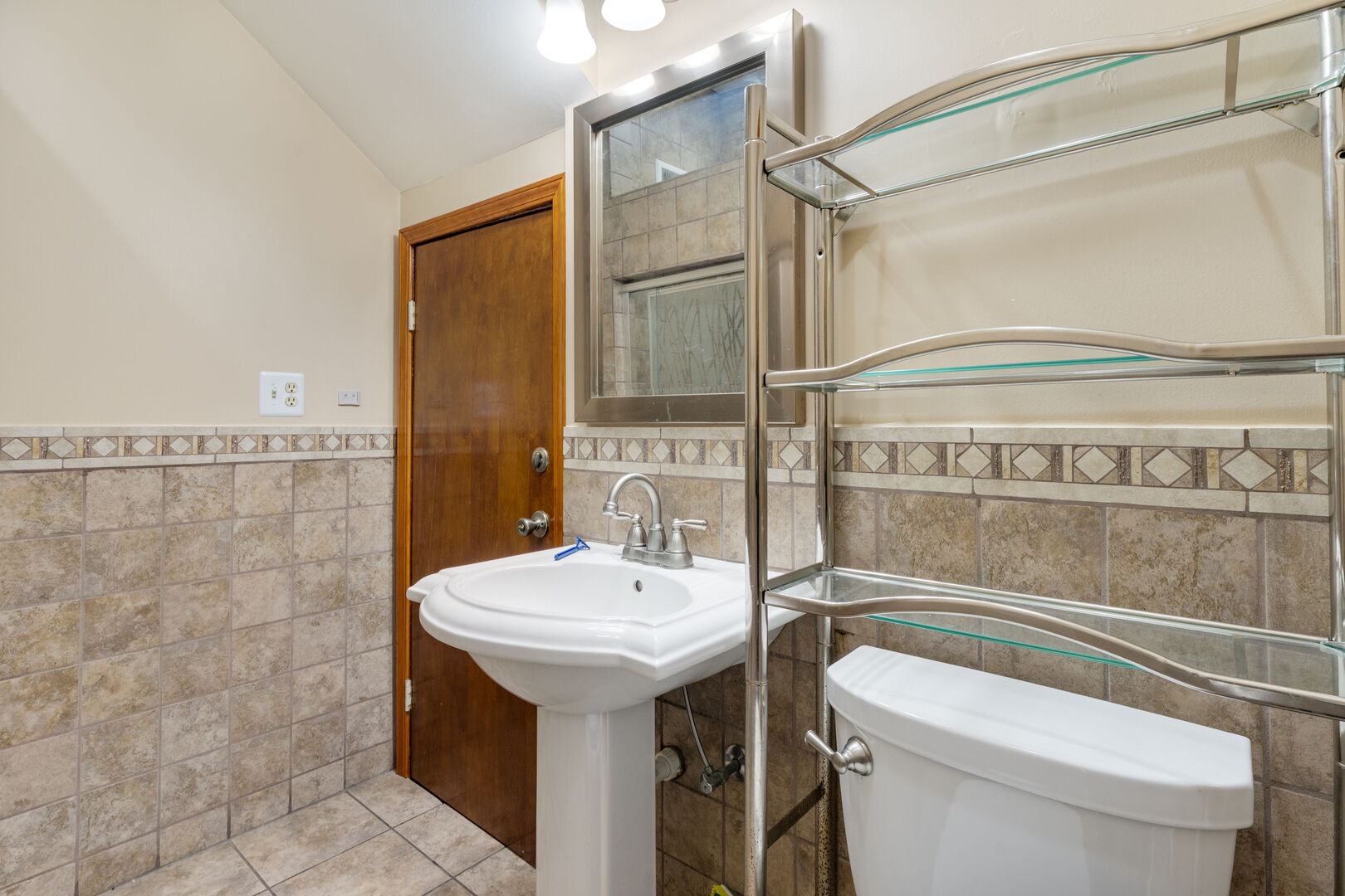 2312 West Taylor Street Chicago, IL 60612 - Photo 11 of 13 a bathroom with a sink a toilet and shower