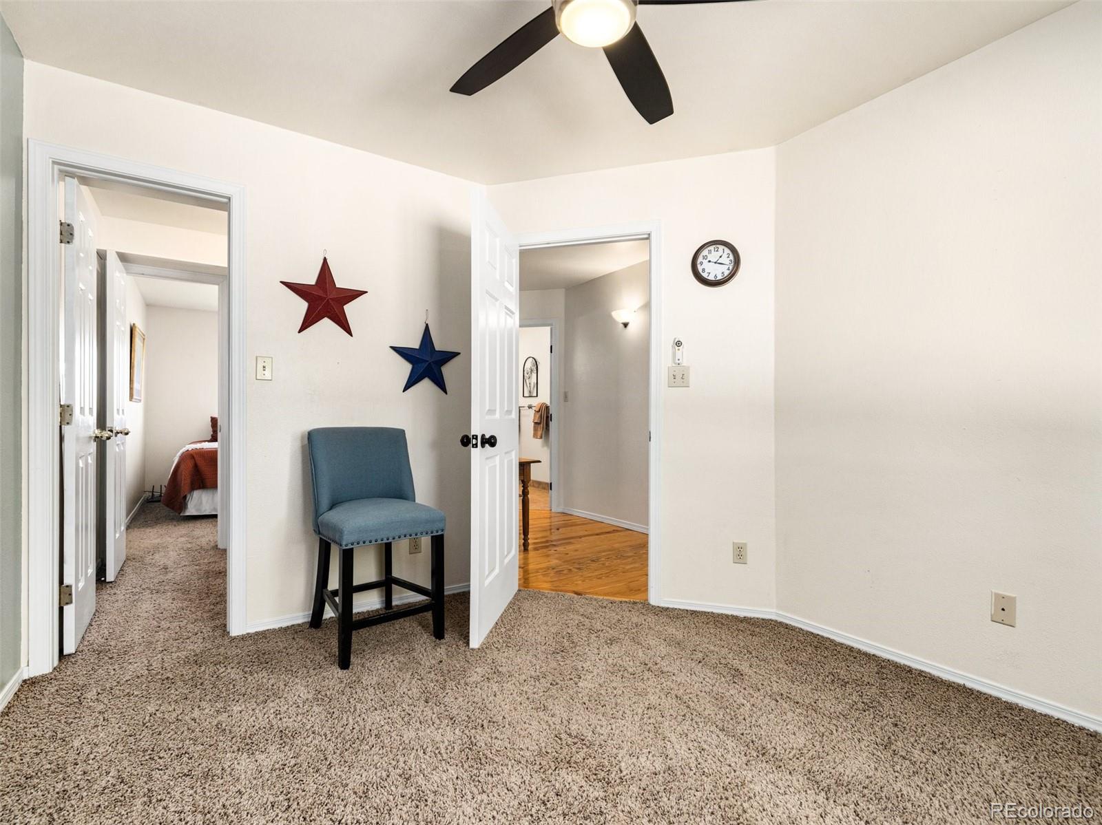 919 South Main Street Fowler, CO 81039 - Photo 14 of 36 a view of a livingroom with furniture and a ceiling fan