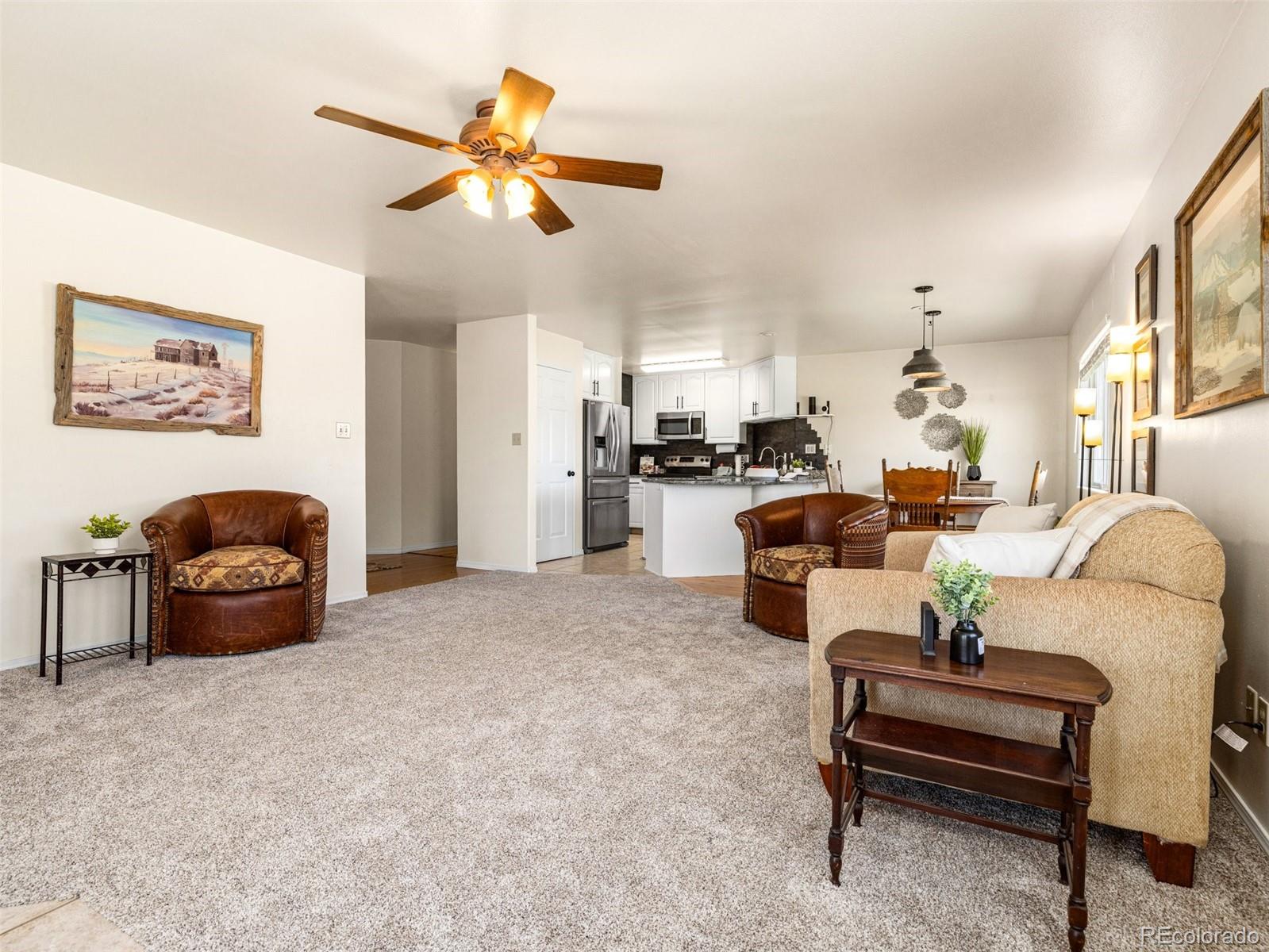 919 South Main Street Fowler, CO 81039 - Photo 2 of 36 a living room with furniture