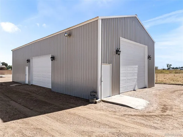 a view of a backyard of a house