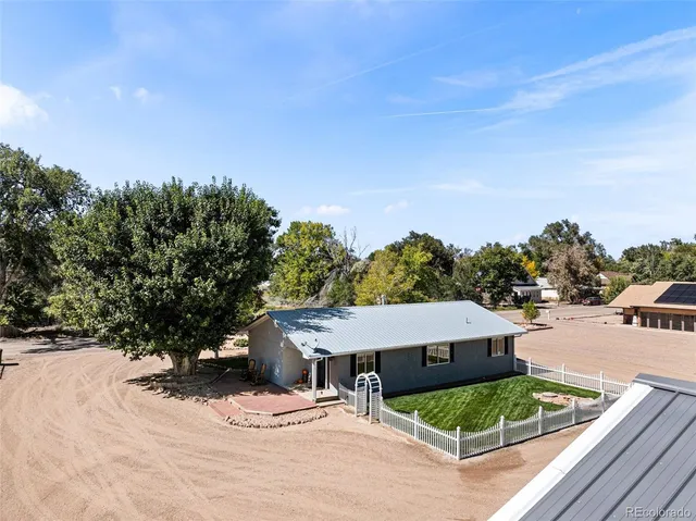 an aerial view of a house having yard