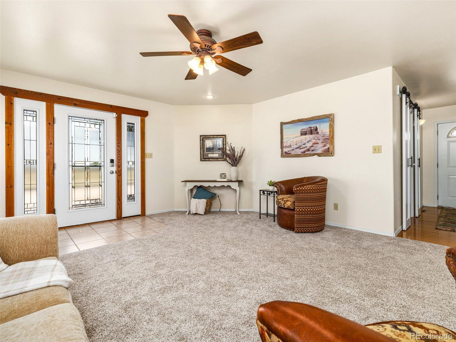 919 South Main Street Fowler, CO 81039 - Photo 5 of 36 a living room with furniture