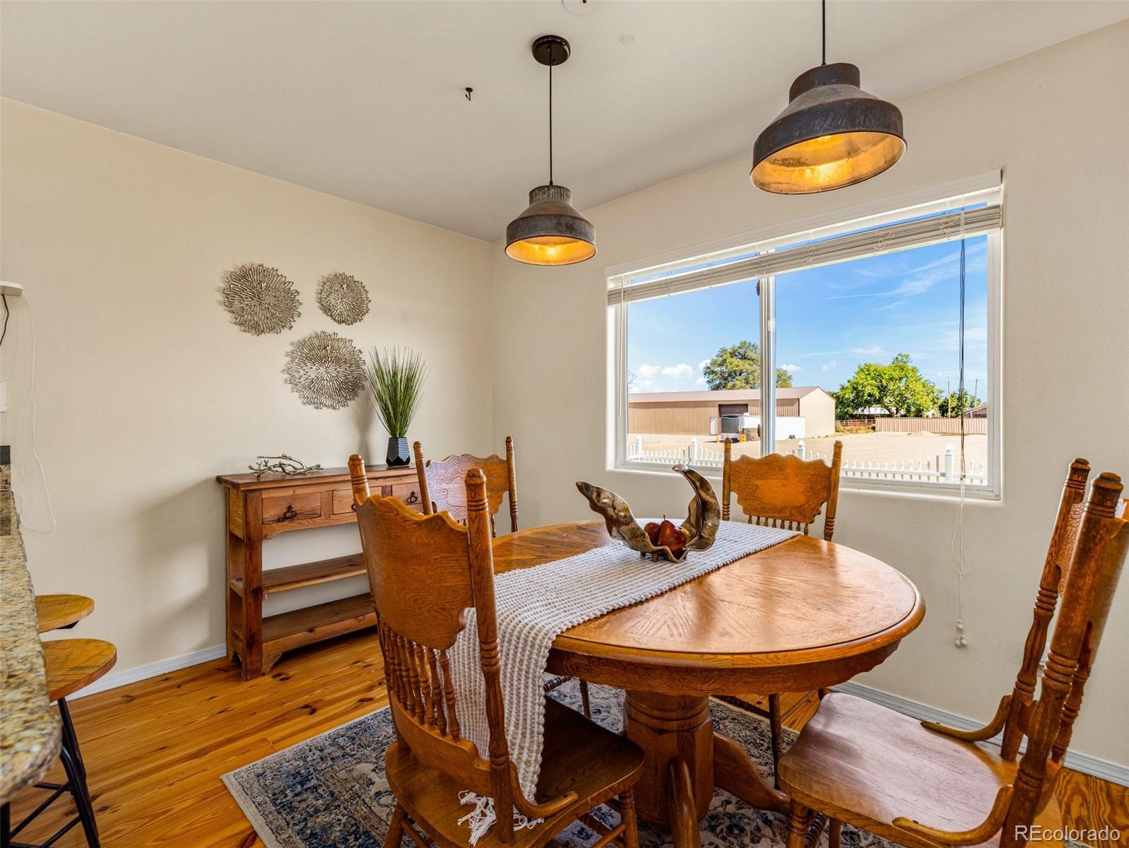 919 South Main Street Fowler, CO 81039 - Photo 7 of 36 a dining room with furniture and window