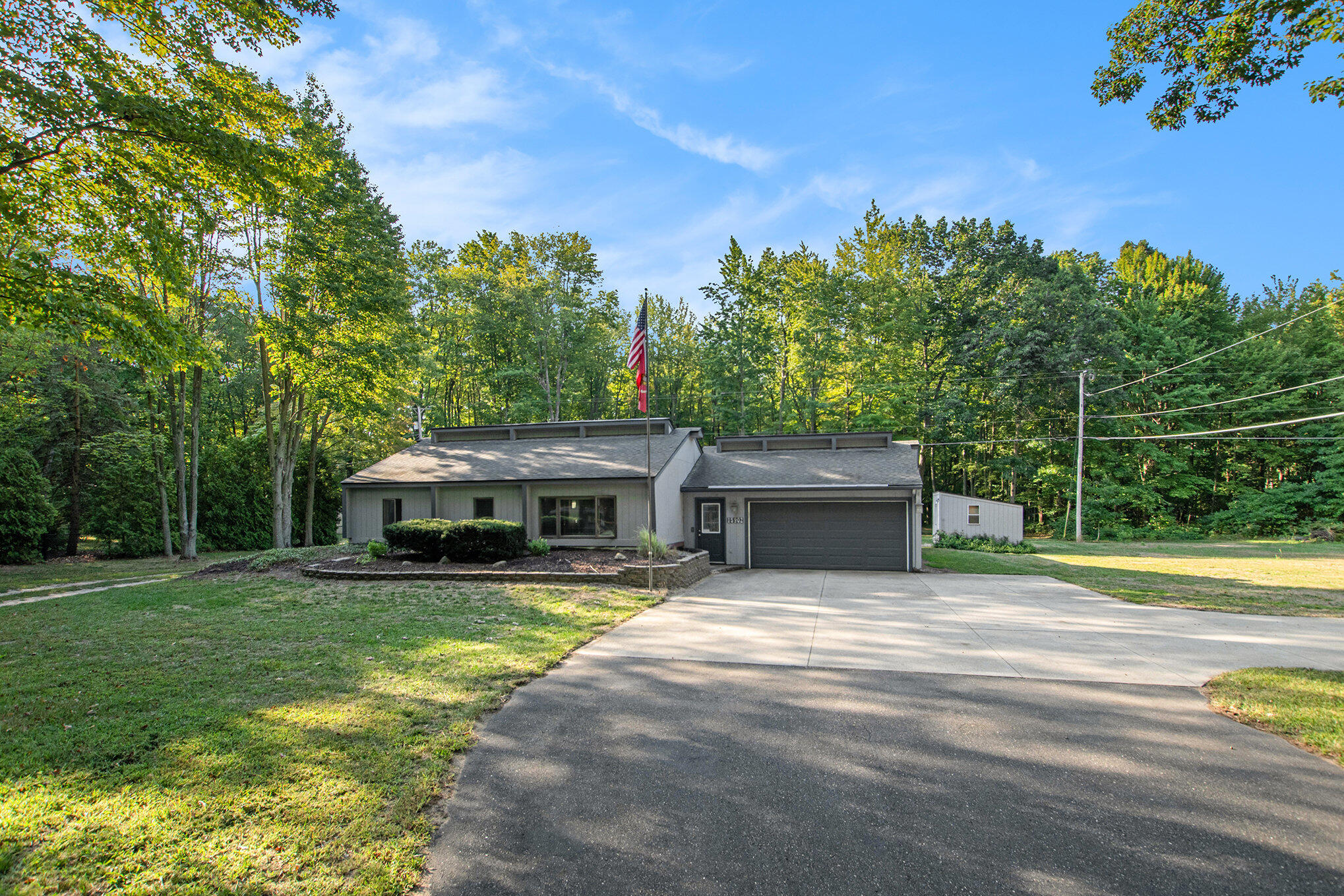 15902 Riley Street Holland, MI 49424 - Photo 1 of 15 002_dng03157_961