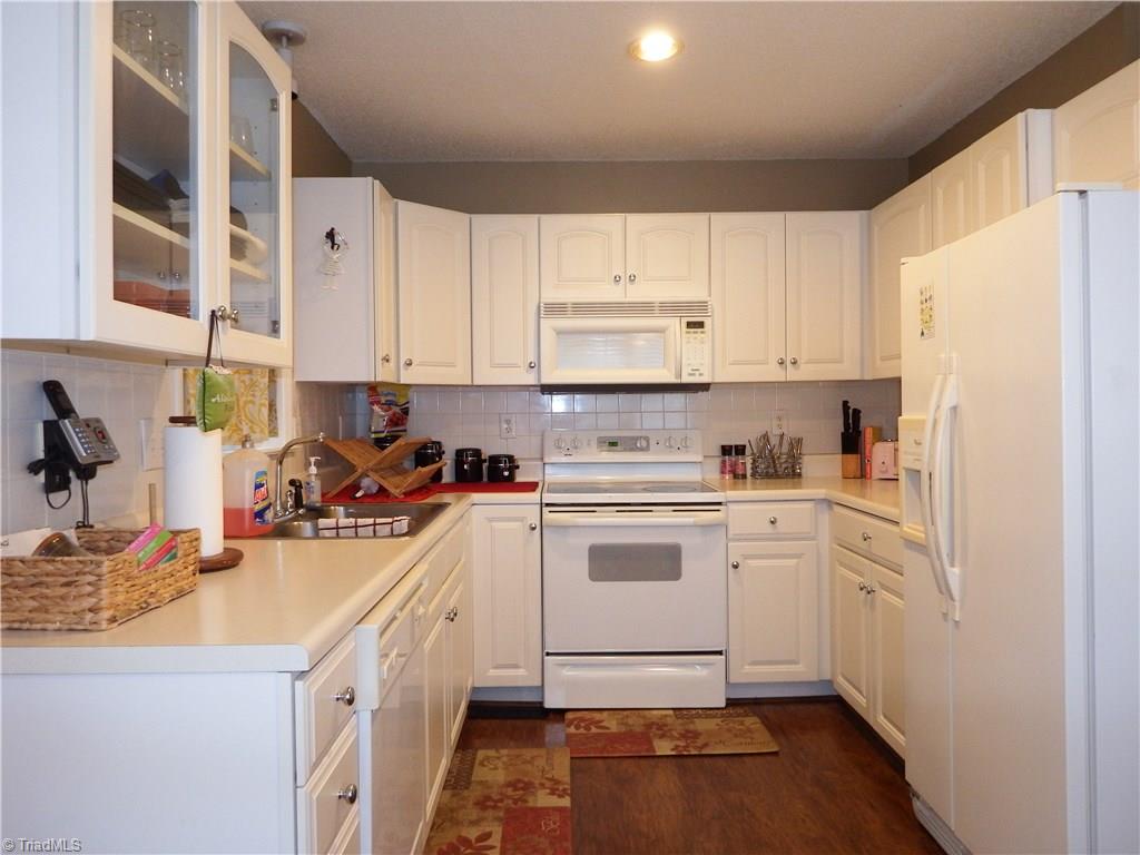 5470 Springhouse Farm Road Winston-Salem, NC 27107 - Photo 5 of 20 Neutral Kitchen with Recessed Lighting
