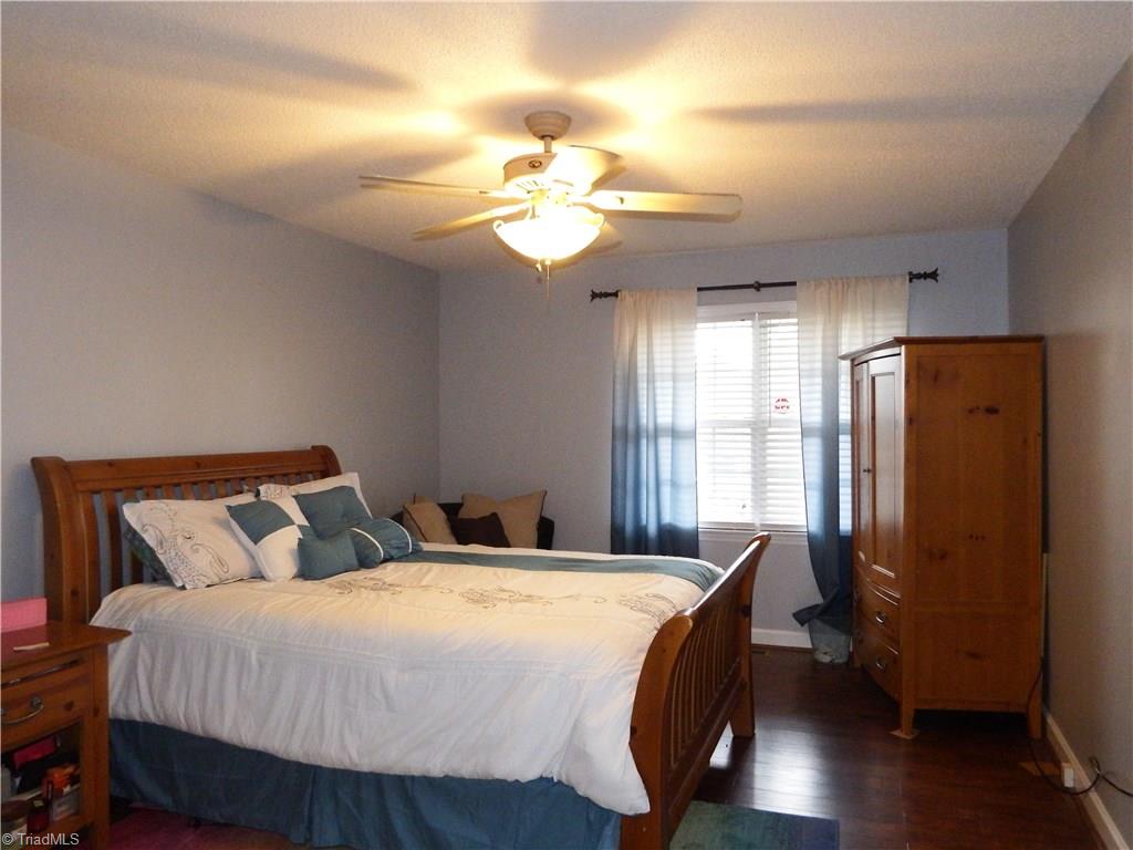 5470 Springhouse Farm Road Winston-Salem, NC 27107 - Photo 8 of 20 Main Level Master Bedroom - New Flooring Throughout Main Level!