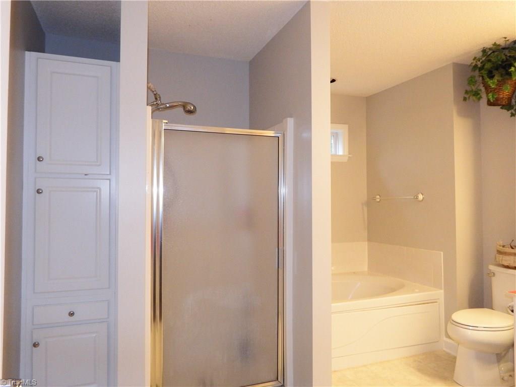 5470 Springhouse Farm Road Winston-Salem, NC 27107 - Photo 9 of 20 Spacious Master Bathroom with Jetted Tub / Separate Shower and Storage!