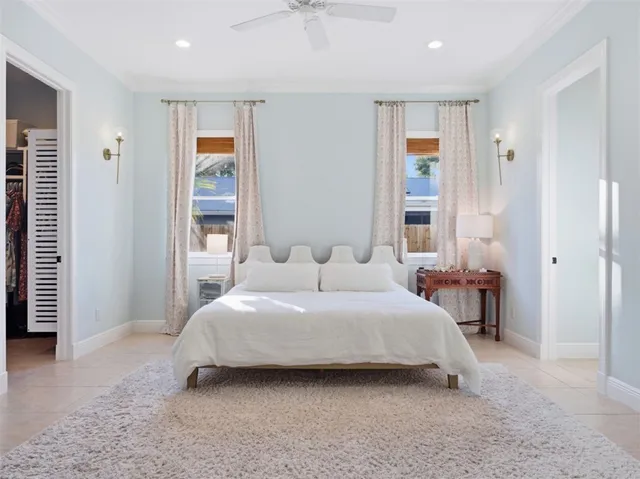 a bedroom with a bed and a cabinets