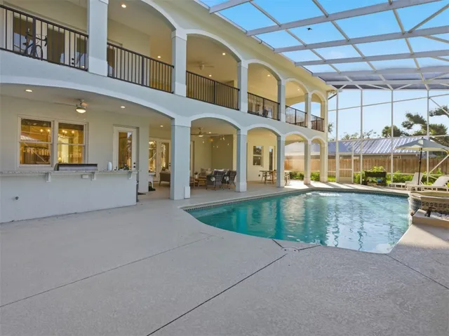 a view of a large building with a swimming pool