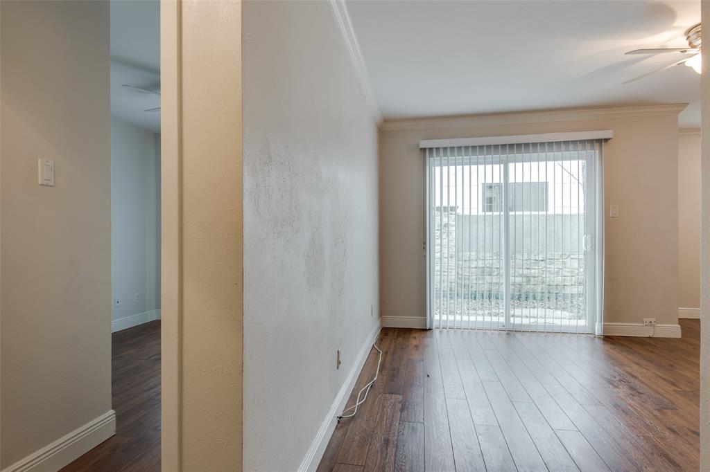 3907 Gilbert Avenue, Unit 5 Dallas, TX 75219 - Photo 8 of 11 wooden floor in an empty room