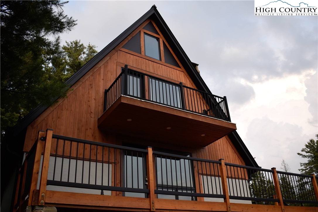 146 Trillium Ridge Boone, NC 28607 - Photo 2 of 41 a view of a house with wooden deck