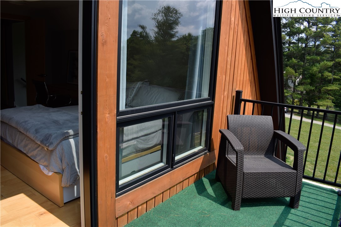 146 Trillium Ridge Boone, NC 28607 - Photo 30 of 41 a view of two chairs in the deck