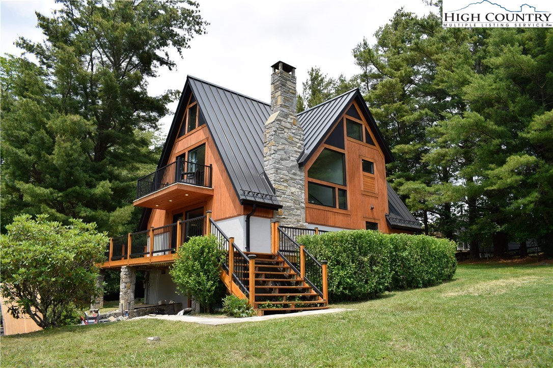 146 Trillium Ridge Boone, NC 28607 - Photo 8 of 41 a front view of a house with a yard