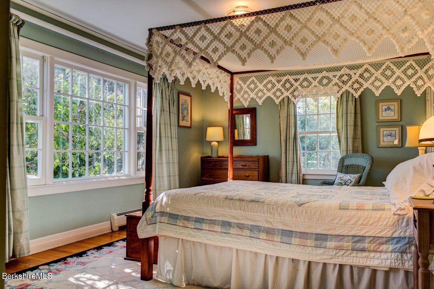 331 Rossiter Road Richmond, MA 01254 - Photo 13 of 28 a bedroom with a bed window and walk in closet