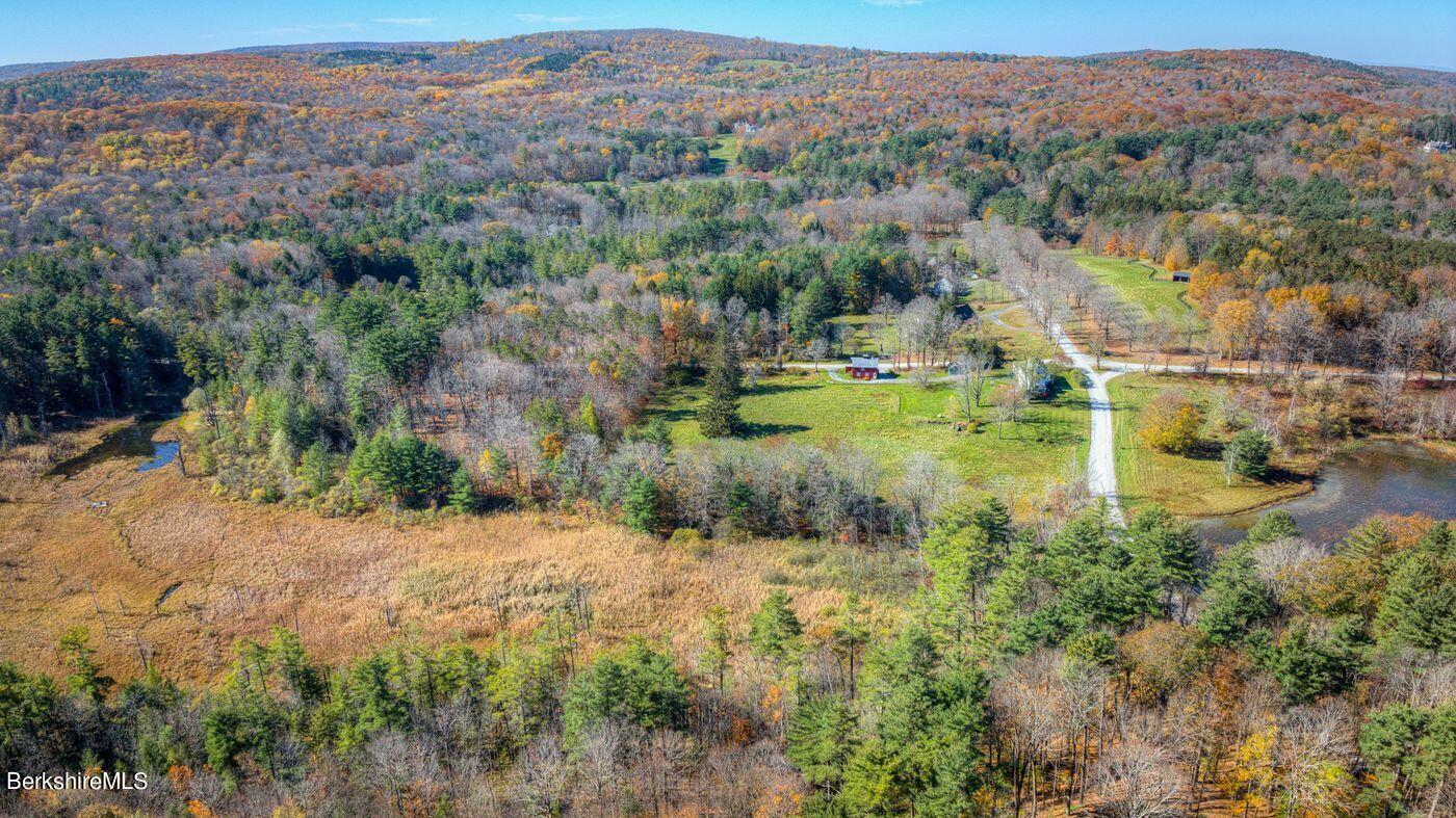 331 Rossiter Road Richmond, MA 01254 - Photo 3 of 28 a view of a town with mountains in the background