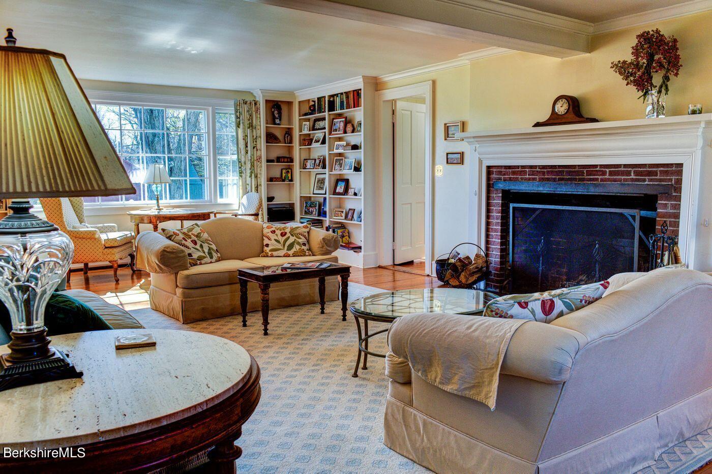 331 Rossiter Road Richmond, MA 01254 - Photo 7 of 28 a living room with furniture and a fireplace