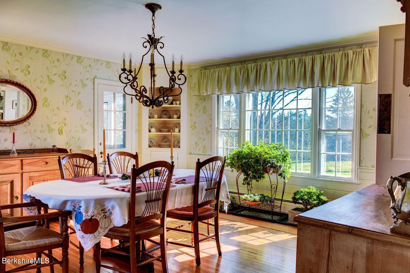 331 Rossiter Road Richmond, MA 01254 - Photo 8 of 28 a view of a dining room with furniture window and outside view