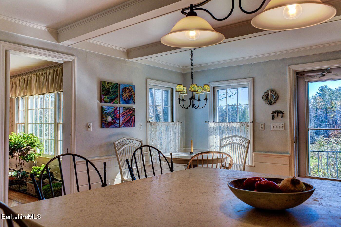 331 Rossiter Road Richmond, MA 01254 - Photo 10 of 28 a view of a dining room with furniture window and wooden floor