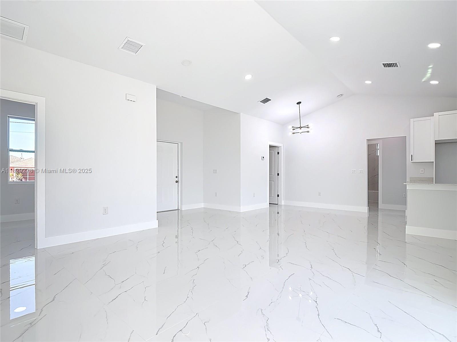 5002 Bygone Street Lehigh Acres, FL 33971 - Photo 30 of 51 a view of an empty room
