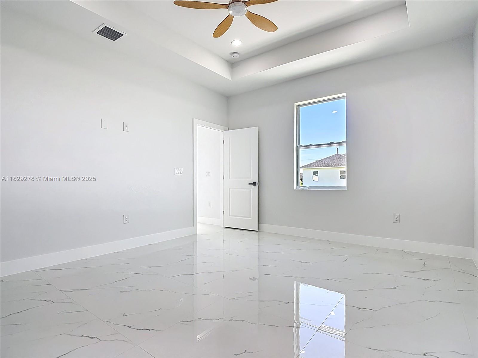 5002 Bygone Street Lehigh Acres, FL 33971 - Photo 33 of 51 a view of an empty room