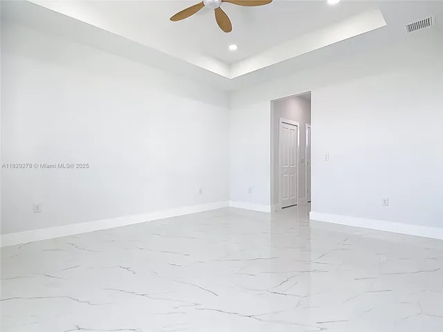 a bathroom with 2 sink and a bathtub