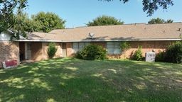 34153 Rochen Road Waller, TX 77484 - Photo 20 of 21 a backyard of a house with lots of green space