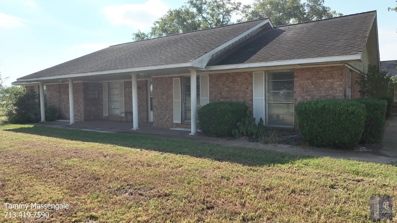 34153 Rochen Road Waller, TX 77484 - Photo 21 of 21 a view of a house with a yard