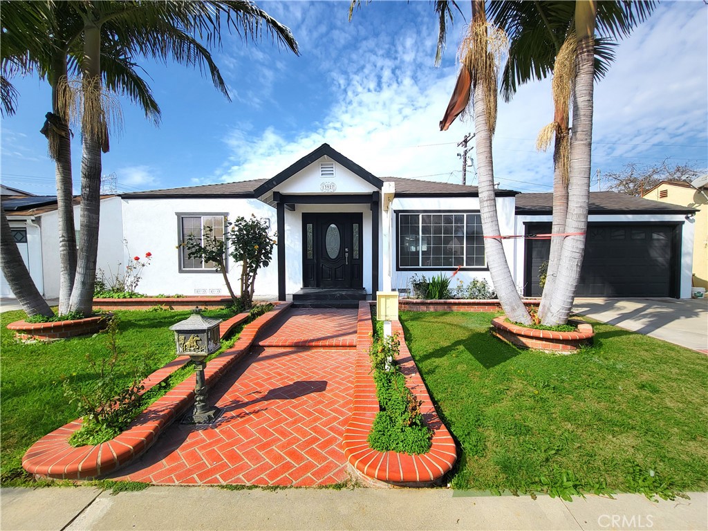 13927 Brightwell Avenue Paramount, CA 90723 - Photo 2 of 36 a view of outdoor space yard and swimming pool