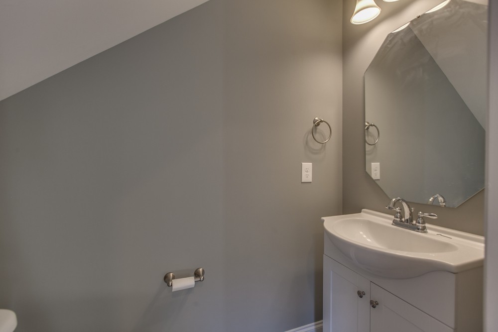 2132 Gracie Bug Loop Murfreesboro, TN 37128 - Photo 13 of 21 a bathroom with a sink and mirror