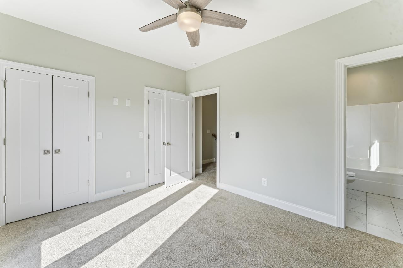 2132 Gracie Bug Loop Murfreesboro, TN 37128 - Photo 15 of 24 a view of a bedroom with closet and bathroom