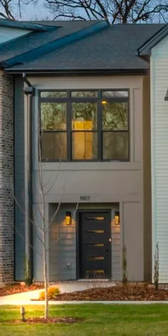 a view of a living room with a fireplace