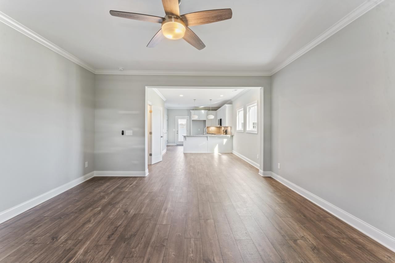2132 Gracie Bug Loop Murfreesboro, TN 37128 - Photo 9 of 24 a view of a hallway with wooden floor