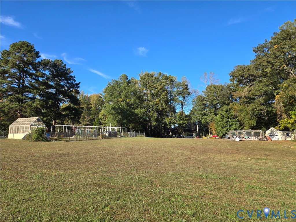 2198 Old Church Road Mechanicsville, VA 23111 - Photo 21 of 50 View of lawn, garden, greenhouse facing the home