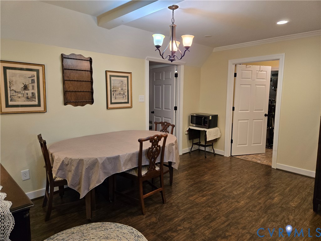2198 Old Church Road Mechanicsville, VA 23111 - Photo 38 of 50 Basement Dining space with a chandelier, dark wood