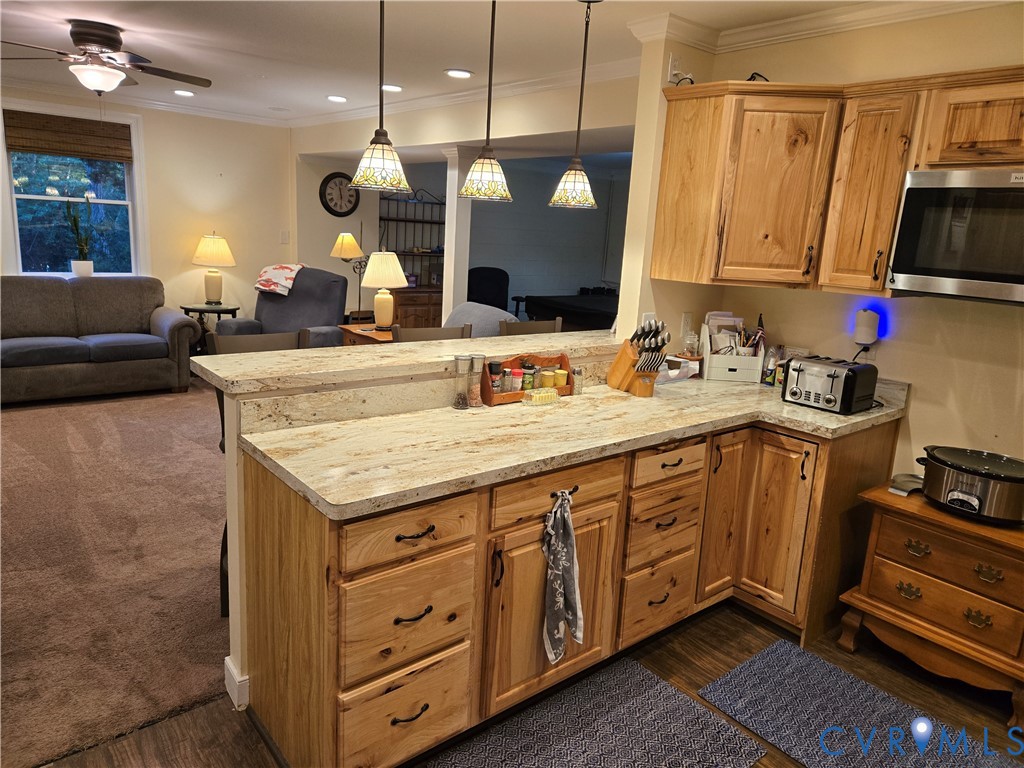 2198 Old Church Road Mechanicsville, VA 23111 - Photo 44 of 50 Basement Kitchen featuring light countertops, a pe