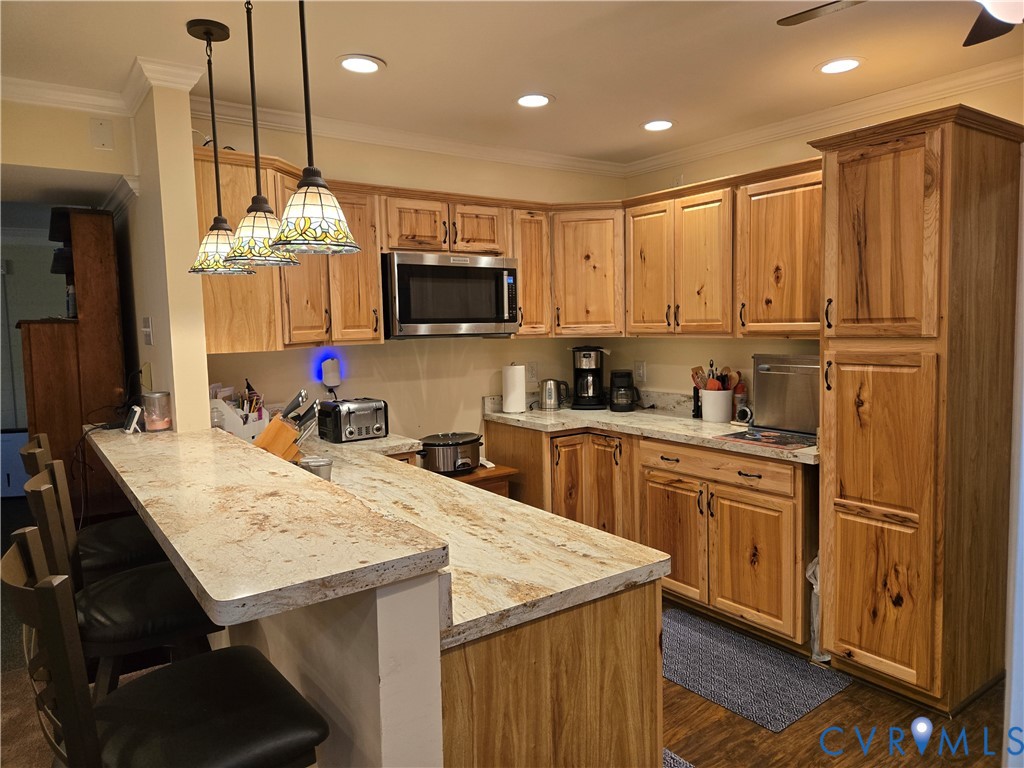 2198 Old Church Road Mechanicsville, VA 23111 - Photo 45 of 50 Basement Kitchen with crown molding, light counter