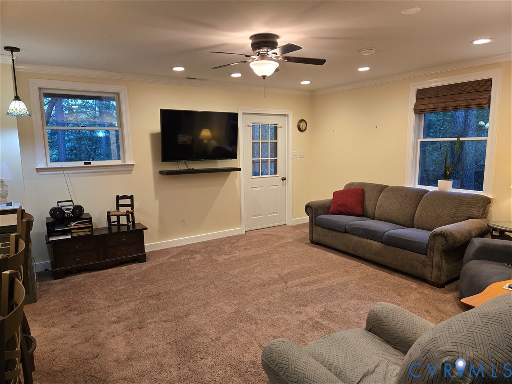 2198 Old Church Road Mechanicsville, VA 23111 - Photo 49 of 50 Basement Living room featuring crown molding, carp