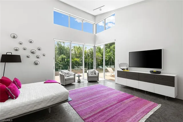 a spacious bathroom with a double vanity sink and a mirror