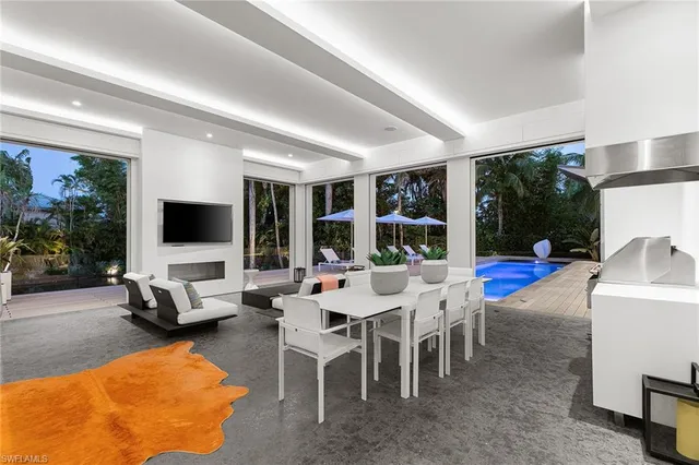 a large white kitchen with lots of counter top space