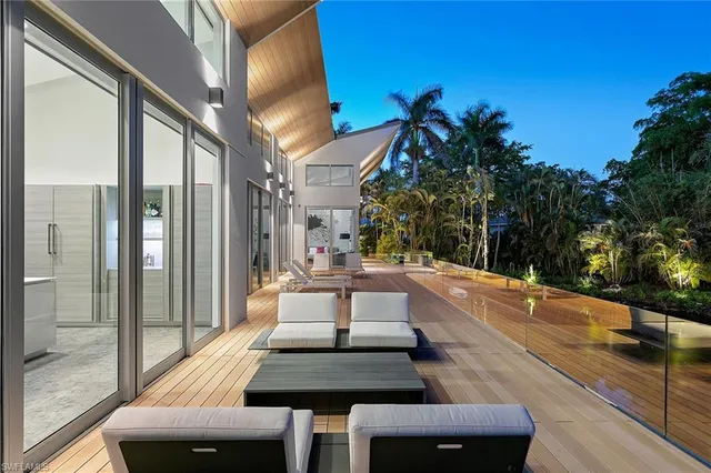 an aerial view of a house with a garden