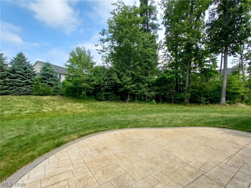 4509 Millbrook Way Akron, OH 44321 - Photo 27 of 27 Curved stamped concrete patio with contrasting border