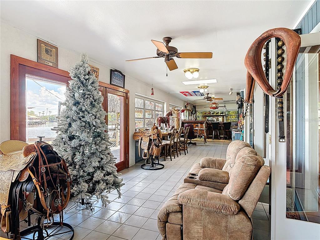 24545 Snail Road Astor, FL 32102 - Photo 27 of 61 a view of a livingroom with furniture and a window
