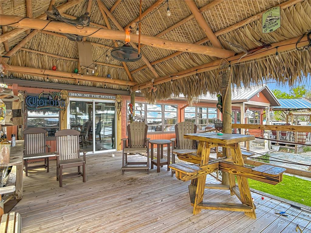 24545 Snail Road Astor, FL 32102 - Photo 34 of 61 a view of a swimming pool with a patio