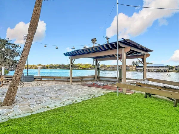 a view of a patio with wooden floor