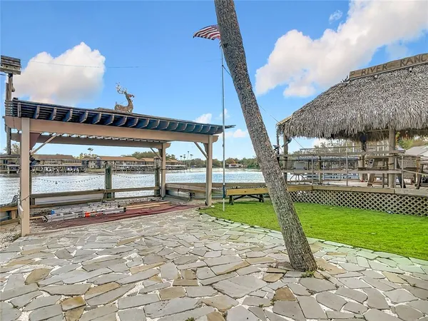 a view of a swimming pool with a patio
