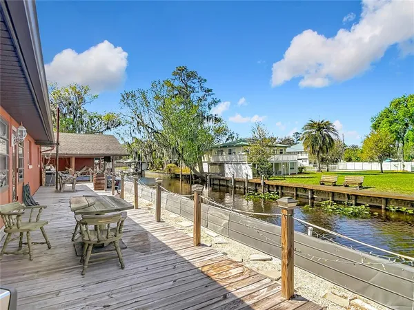 a room with lots of tables and chairs