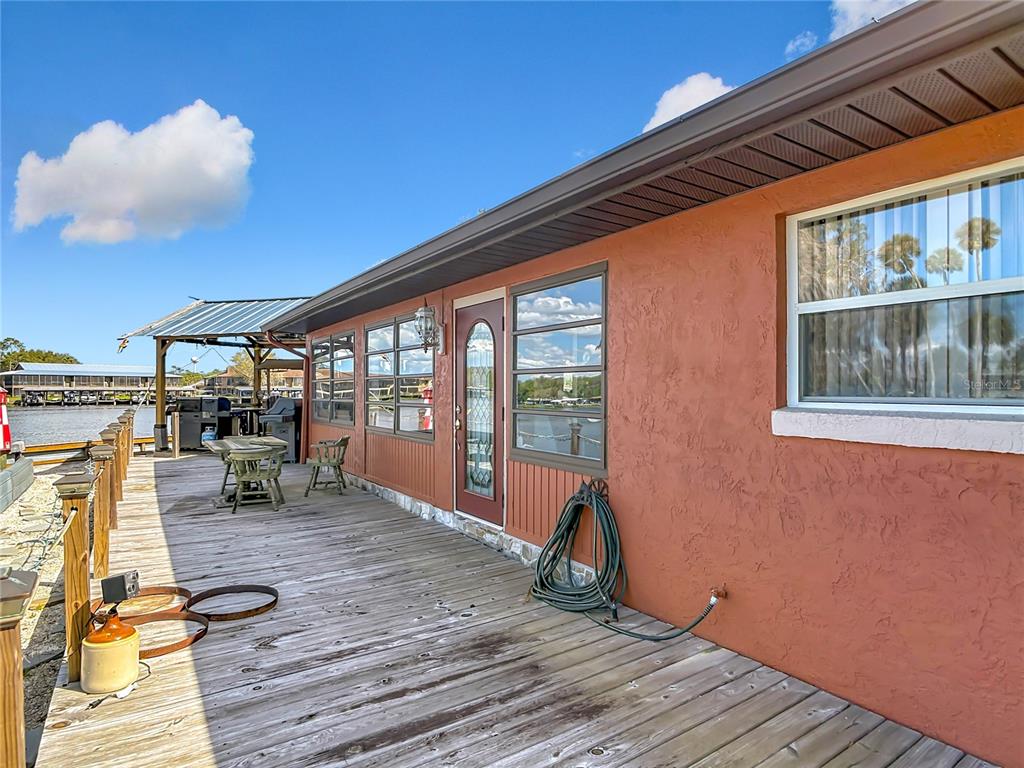 24545 Snail Road Astor, FL 32102 - Photo 45 of 61 a view of steet with deck